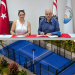 Tatlısu’da, ücretsiz tenis kortu ve modern yeşil alan projesi için imzalar atıldı
