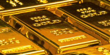 Gold edges higher on soft dollar and lower Fed hike bets